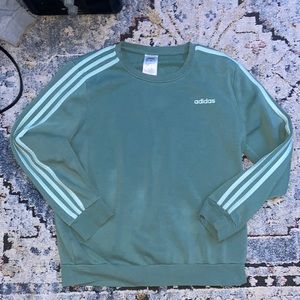 I am selling a sage green crewneck, The brand is adidas in good condition.